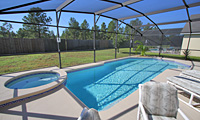 Westridge - Newly Furnished Luxury 5 Bedroom 3 Bath Florida Villa near Disney World, with FREE Wireless Internet, FREE International Calling, SOUTH Facing Pool and Spa, Gamesroom